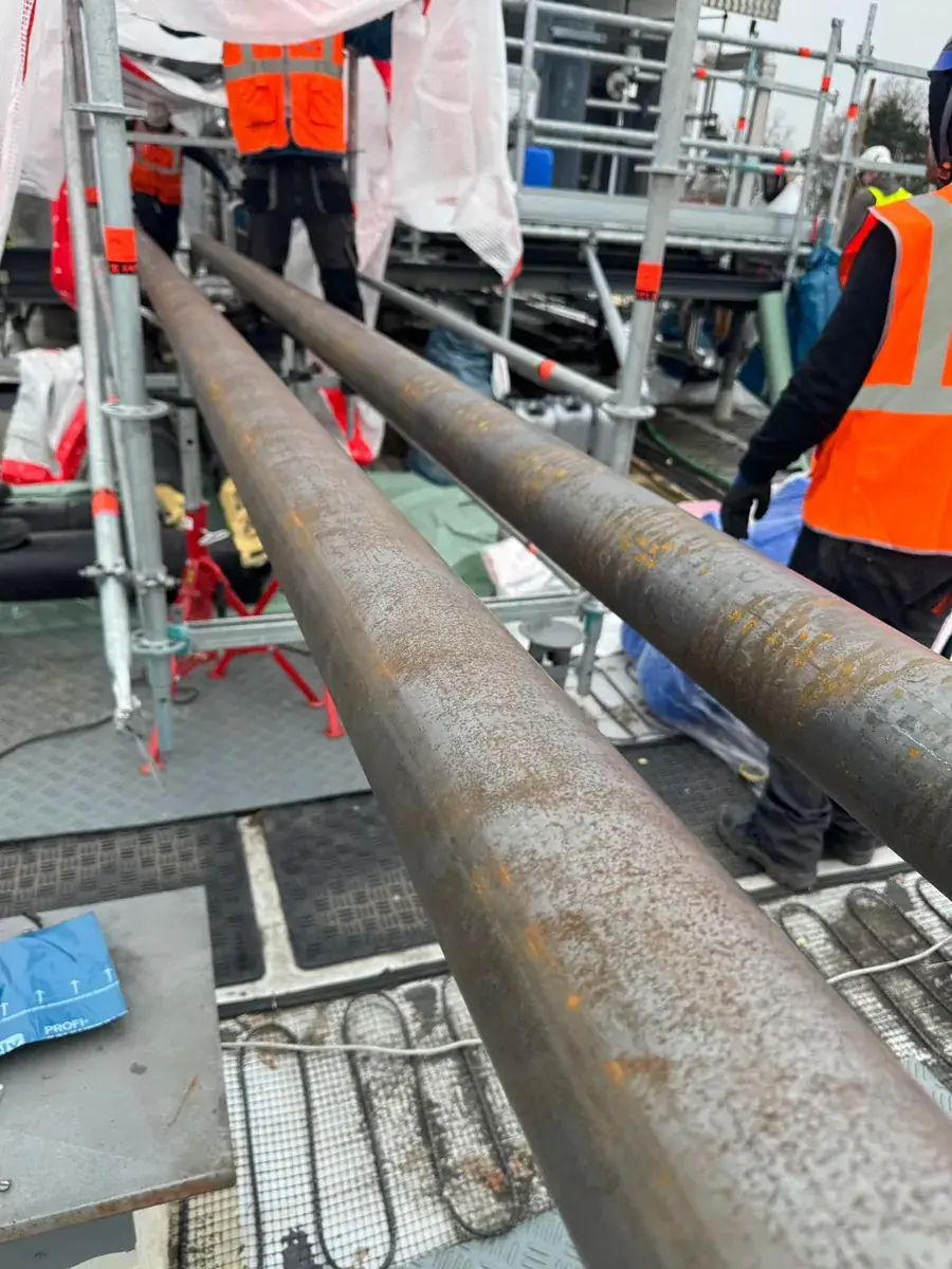 Carbon steel lines being set out on a plant roof